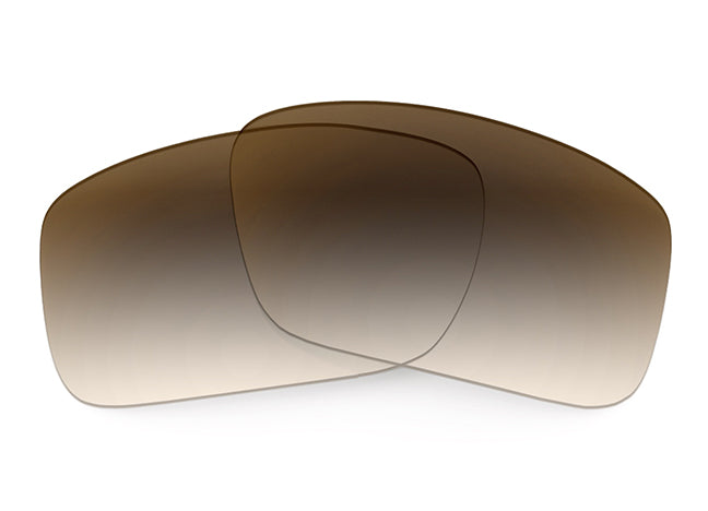 Two Brown Gradient Sunglass lenses laid on top of each other.